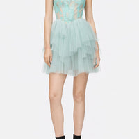 Abito corto in tulle stratificato con bustier in lattice e scollo halter