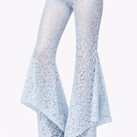 Pantalone flare in pizzo macramé con balza asimmetrica e vita alta