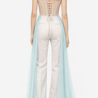 Top corsetto in crinolina nude con drappeggio incrociato in tulle azzurro e pannelli lunghi